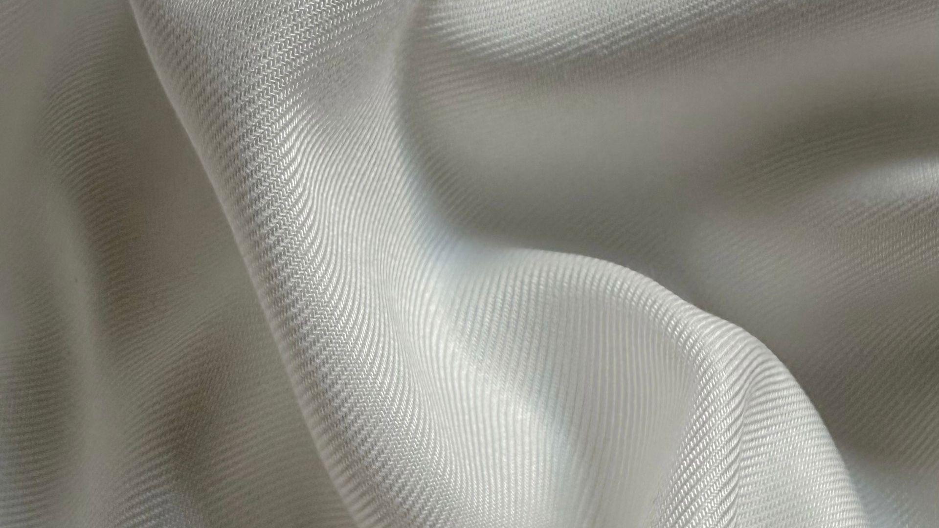 Macro close-up of twill fabric showing clear diagonal ribs